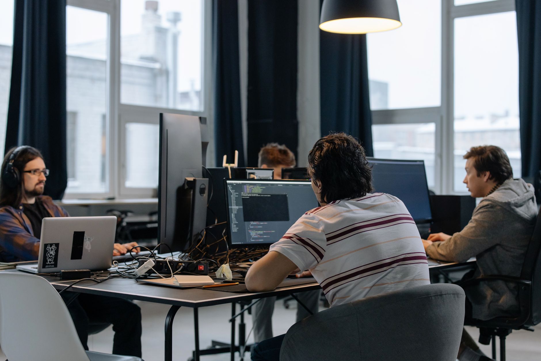 Photo: cottonbro studio / Pexels Custom AI solution development team at work